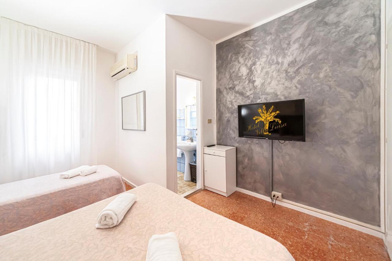 Hotel Villa Luisa Lignano Sabbiadoro Buitenkant foto