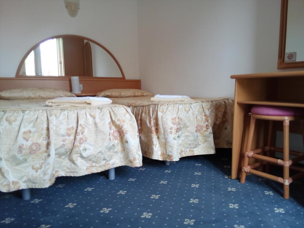 Hotel Villa Luisa Lignano Sabbiadoro Buitenkant foto
